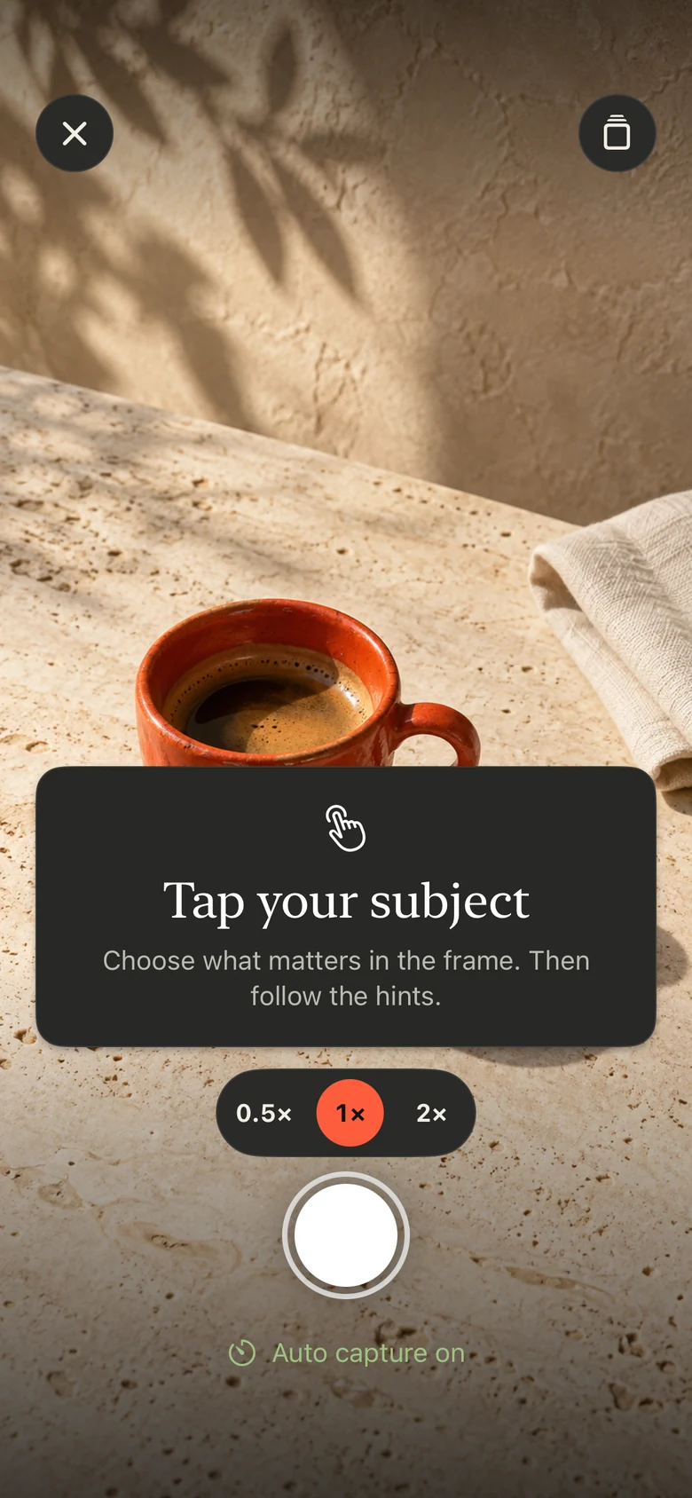 Take PRO demo camera screen showing a coffee cup and the prompt Tap your subject.